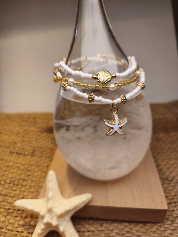 trilogie d'Amphitrite, bracelet de perle avec symboles étoile et coquillage